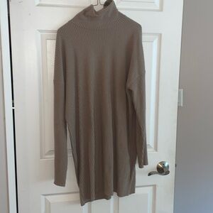 Khaki turtleneck sweater dress perfect for the fall